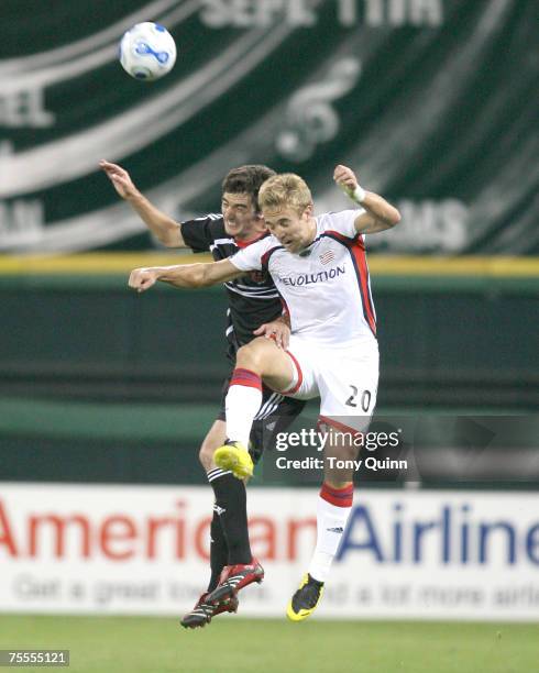 Taylor Twellman and Facundo Erpen go up for a header. DC United still without a win this season at least managed to grab a point on Jaime Moreno's...