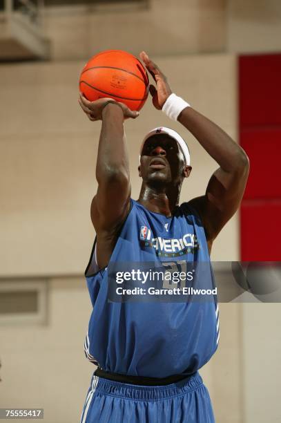 Pops Mensah-Bonsu of the Dallas Mavericks shoots a free throw during Game One of the NBA Summer League against the Portland Trail Blazers on July 8,...