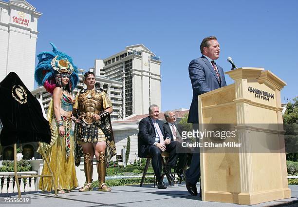 Roman characters Cleopatra and Julius Caesar, President of Harrah's Entertainment, Inc. Western Division Tom Jenkin, and Caesars President Gary...