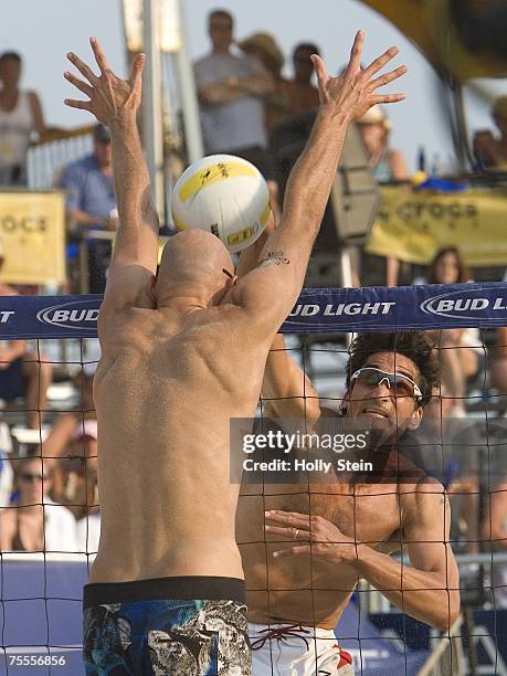 Mike Lambert tries to get the ball past Phil Dalhausser during men's finals in the AVP Seaside Heights Open at Seaside Heights Beach on July 8, 2007...