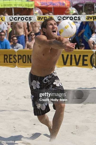Ty Loomis digs the ball during men's main draw against Sean Rosenthal and Jake Gibb in the AVP Seaside Heights Open at Seaside Heights Beach on July...