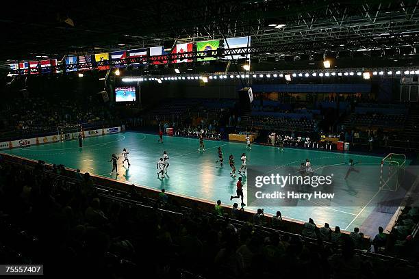 Fabiana Gripa of Brazil scores a goal against the Dominican Republic during the Women's Handball semi-final in the 2007 XV Pan American Games at the...