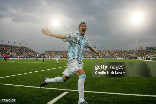 Angel Di Maria of Argentina celebrates scoring the first goal against Chile during their semi-final game at the Fifa U-20 World Cup Canada 2007 at...