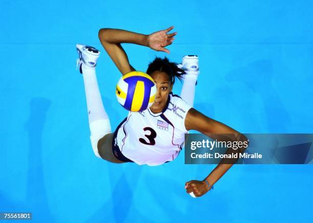 Tayyiba Haneef-Park of the USA jumps up to serve the ball in the Women's Indoor Volleyball Bronze Medal Match during the XV Pan American Games on...
