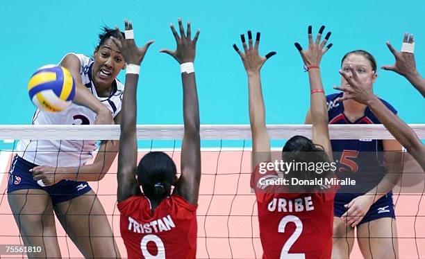 Tayyiba Haneef-Park of the USA spikes the ball against Peru in the Women's Indoor Volleyball Bronze Medal Match during the XV Pan American Games on...