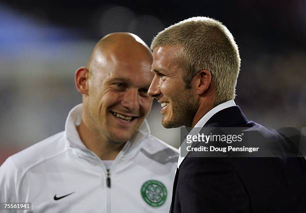 David Beckham of the Los Angeles Galaxy has a word with former Real Madrid teammate Thomas Gravesen of Glasgow Celtic FC before awarding the U-17 MLS...