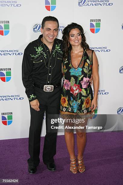Singer Cristian Castro and wife pose on the red carpet for the Premios Juventud Awards at the Bank United Center on July 19, 2007 in Miami, Florida.