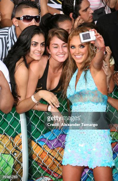 Anahi Giovanna Puente of the band RBD poses with fans at the Bank United Center for the Premios Juventud Awards on July 19, 2007 in Coral Gables,...