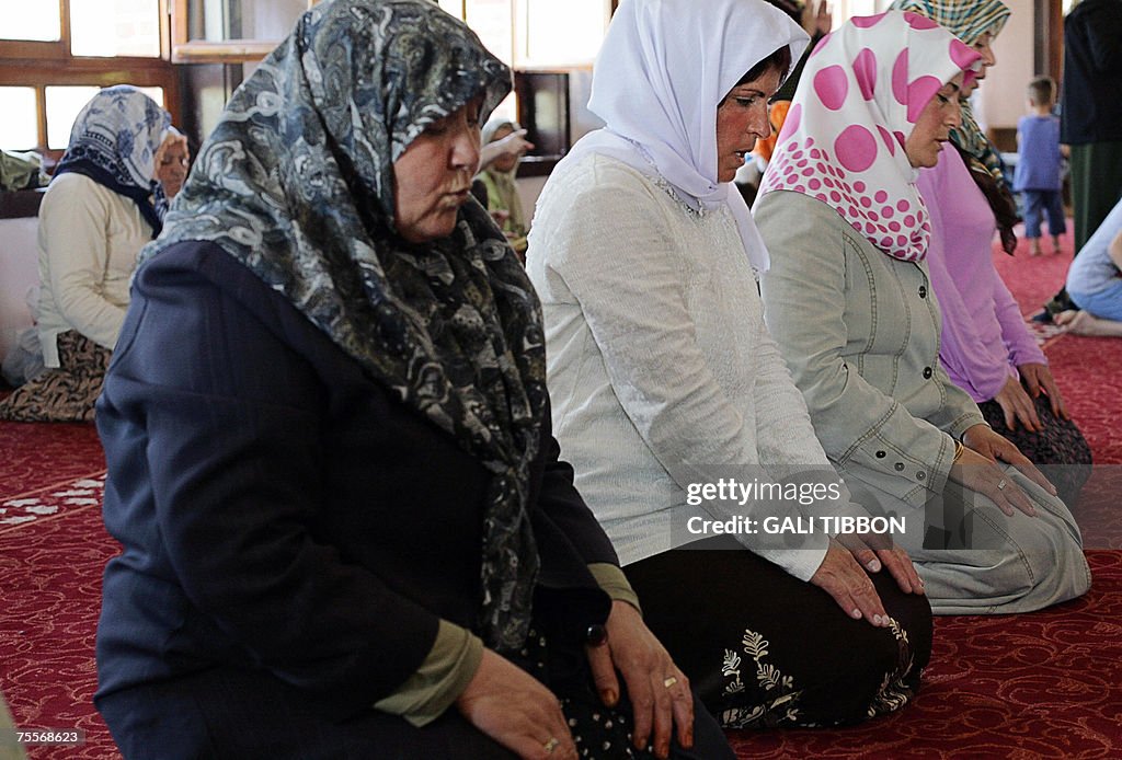 Turkish women pray during the Friday noon prayer at the Haci Bayran News  Photo - Getty Images