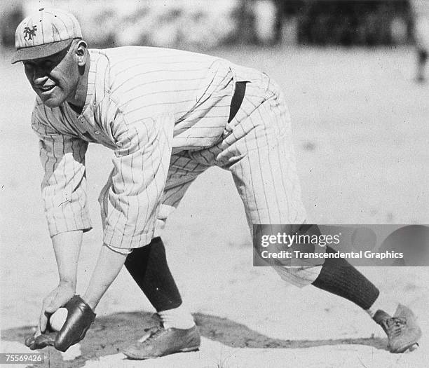 Jim Thorpe, Olympic star and outfielder for the New York Giants, takes some ground balls at the Polo Grounds before a game in 1915.