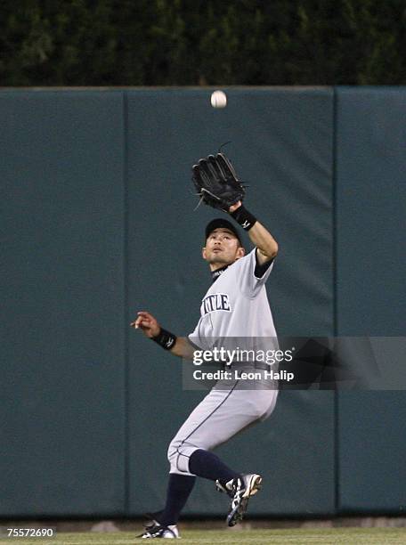 Seattle Mariners centerfielder Ichiro Suzuki catches Brandon Inges fly ball to center field in the seventh inning. The Detroit Tigers defeated the...