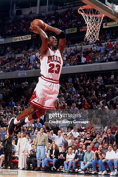 Michael Jordan of the Chicago Bulls attempts a dunk against the Orlando Magic during Game Four of the 1995 Eastern Conference Semi-Finals at the...