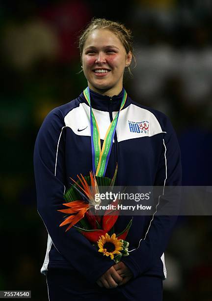 Ronda Rousey of the United States of America smiles on the podium with her gold medal after winning the Women's 70Kg Judo final in the 2007 XV Pan...