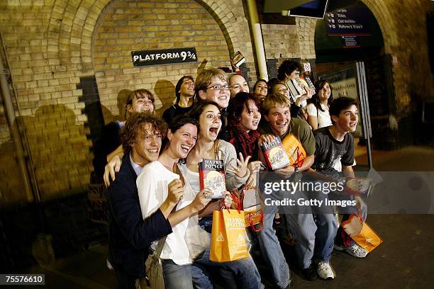 American students celebrate the release of the latest and final book by author J.K. Rowling, "Harry Potter and the Deathly Hallows" in Kings Cross...
