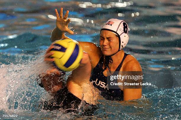 Jessica Steffens of the USA tries to block a shot against Canada in the women's water polo finals during the XV Pan American Games at Julio Delamare...