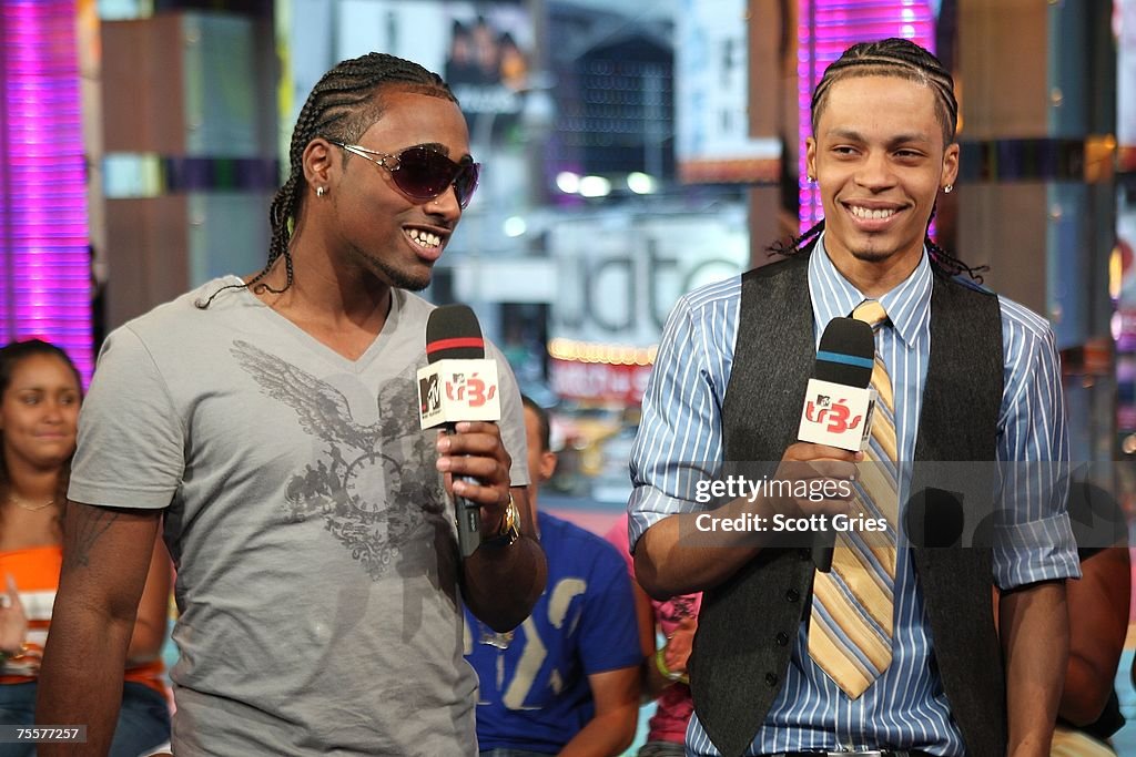 Kilo Singer Singers Danny D and Steve Styles of Xtreme appear onstage during ...