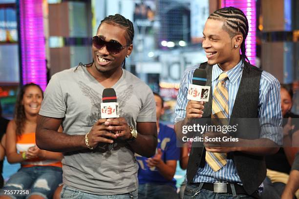 Singers Danny D and Steve Styles of Xtreme appear onstage during MTV's Mi Total Request Live at the MTV Times Square Studios on July 17, 2007 in New...