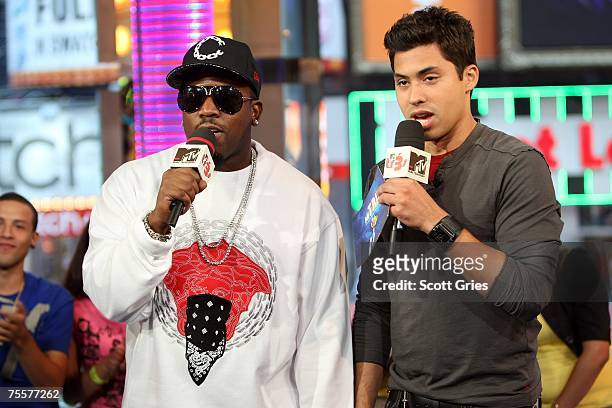 Rapper Big Boi appears onstage with host Carlos Santos during MTV's Mi Total Request Live at the MTV Times Square Studios on July 17, 2007 in New...