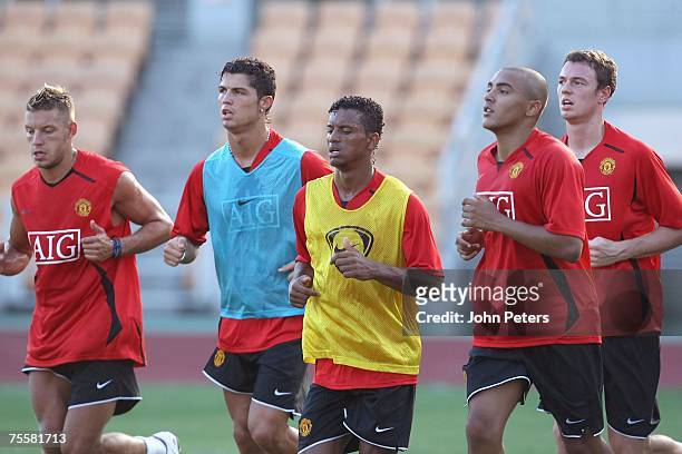 Alan Smith, Cristiano Ronaldo, Nani, Danny Simpson and Jonny Evans of Manchester United in action during a First Team training session at Macau...