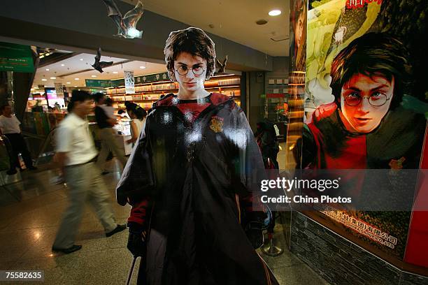 Posters of the final chapter in the Harry Potter series "Harry Potter and The Deathly Hallows", and Harry Potter are seen at a bookstore on July 21,...