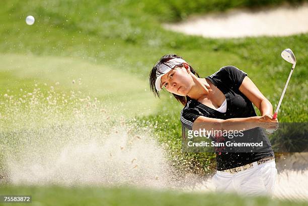 Amy Hung of Taiwan hits a shot from the bunker on the 18th hole during the third round of the HSBC Women's World Match Play at Wykagyl Country Club...
