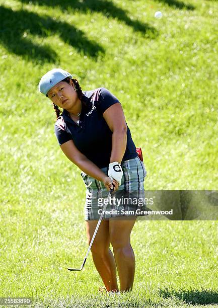 Christina Kim plays a shot from the rough on the 16th hole during the third round of the HSBC Women's World Match Play at Wykagyl Country Club on...