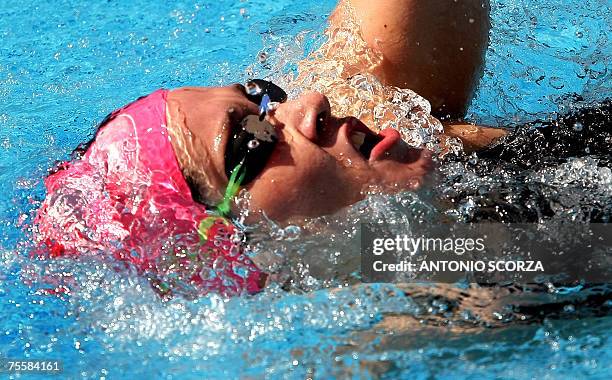 Rio de Janeiro, BRAZIL: Venezuela' swimmer Erin Volcan takes part in the 200m backstroke style semifinal, 21 July 2007, during the XV Pan American...