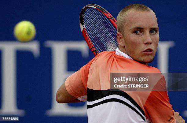 Amersfoort, NETHERLANDS: Belgian Steve Darcis hits shot against Russian Mikhail Youzhny during the semi-finals of the Dutch Open tennis tournament,...