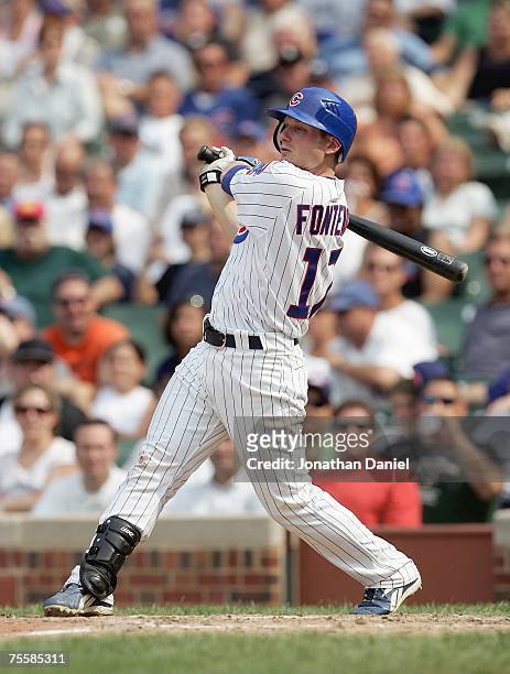 Mike Fontenot of the Chicago Cubs swings at the pitch during the game against the San Francisco Giants on July 18, 2007 at Wrigley Field in Chicago,...