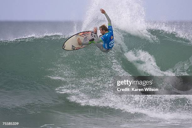 Taj Burrow of Yallingup, WA, Australia competes on his way to clinching the Billabong Pro title July 21, 2007 at Jeffreys Bay, South Africa. Burrow...