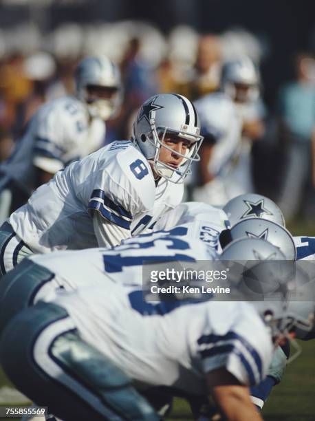 Troy Aikman, Quarterback for the Dallas Cowboys prepares for the snap during the National Football Conference West game against the Los Angeles Rams...