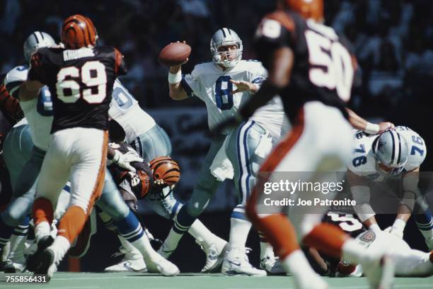 Troy Aikman, Quarterback for the Dallas Cowboys prepares to throw during the National Football Conference East game against the Cincinnati Bengals on...