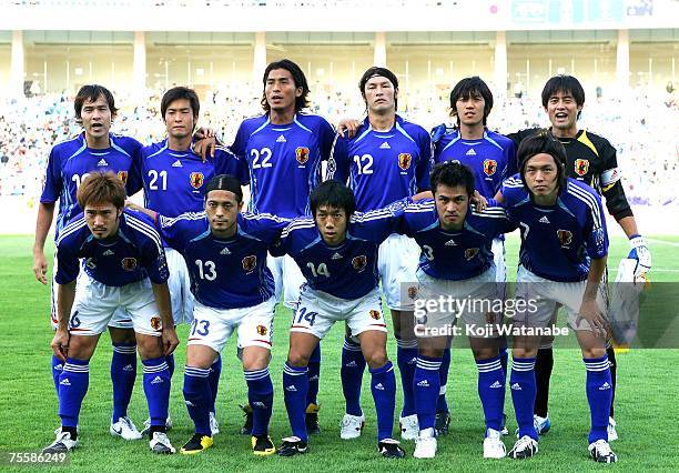 The Japanese team lines up for the start of the AFC Asian Cup 2007 Quarter Final between Japan and the Australian Socceroos at My Dinh National...