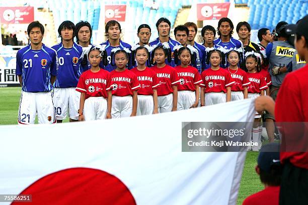 The Japanese team lines up for the start of the AFC Asian Cup 2007 Quarter Final between Japan and the Australian Socceroos at My Dinh National...