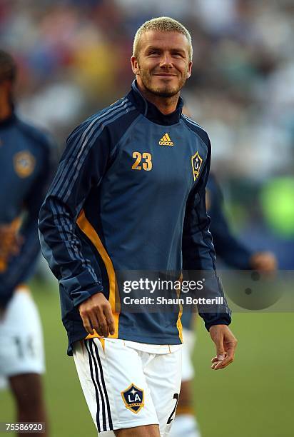 David Beckham of the Los Angeles Galaxy smiles toward the stands after the first half against Chelsea FC during the World Series of Football match at...