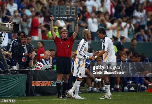 David Beckham of the Los Angeles Galaxy enters the game in the second half against Chelsea FC during the World Series of Football match at the Home...