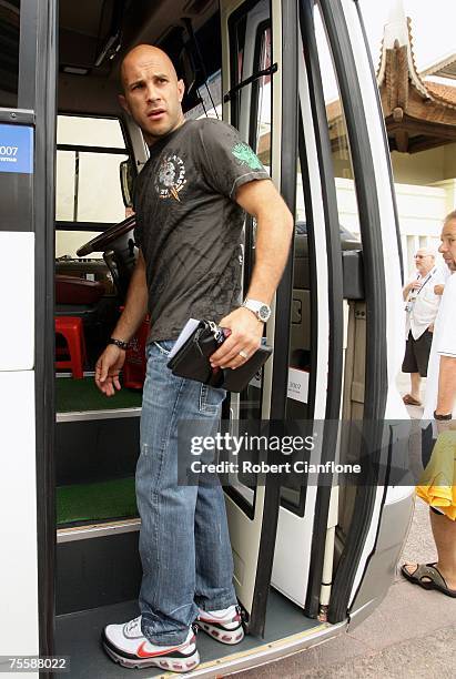 Marco Bresciano of Australia leaves the team hotel with fellow members of the Australian Socceroos at the Sheraton Hotel on July 22, 2007 in Hanoi,...