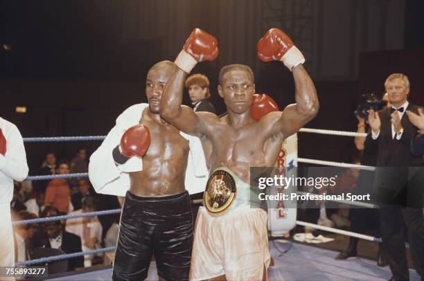British professional boxer Chris Eubank celebrates after beating Kid Milo to retain his WBC international middleweight title at the Brighton Centre...