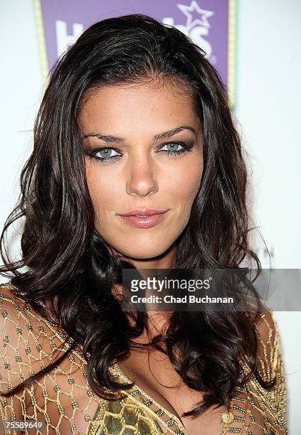 Model/Actress Adrianne Curry attends the H.E.R. Luau at The Playboy Mansion on July 21, 2007 in Holmby Hills, California.