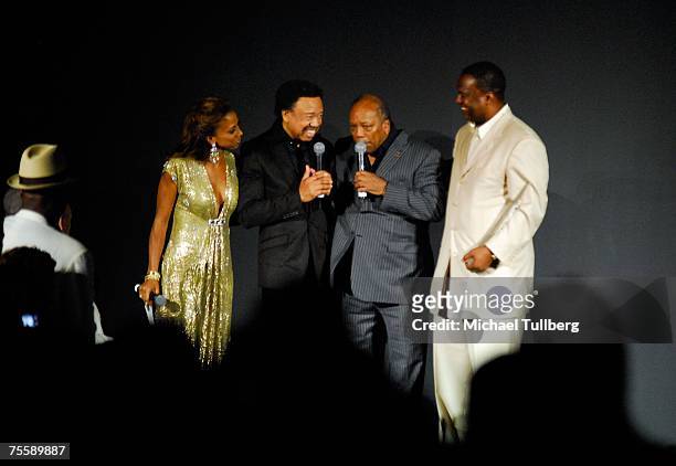 Actress Holly Robinson Peete, producer Quincy Jones and former NFL quarterback Rodney Peete honor musician Maurice White onstage at the "Designcare...