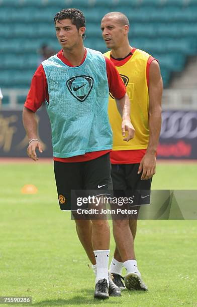 Cristiano Ronaldo and Rio Ferdinand of Manchester United in action during a First Team training session at Macau Stadium on July 22 2007, in Macau,...