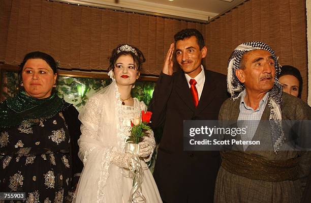 Kurds celebrate a wedding March 27, 2002 in Suleimaniyeh, part of the northern Iraq "safe haven" controlled by the Patriotic Union of Kurdistan - one...