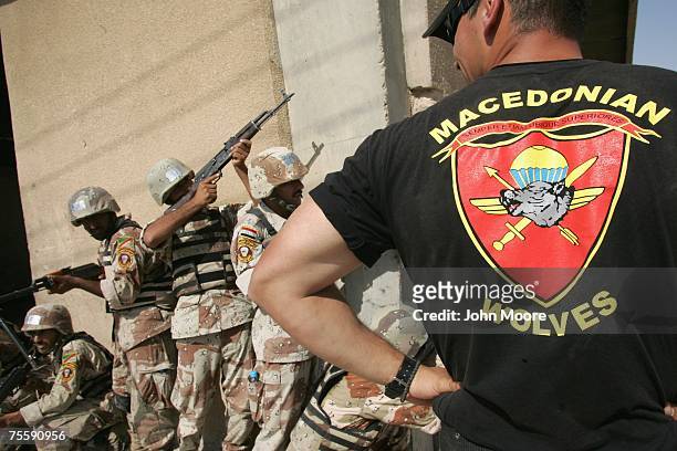 Iraqi Army troops from the Muthana Brigade train July 22, 2007 at a base on the outskirts of Baghdad, Iraq. Macedonian special forces, part of the...