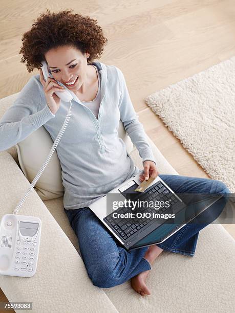 woman shopping online - land line phone stock pictures, royalty-free photos & images