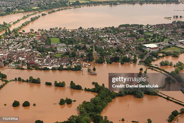 The town of Upton on Severn is pictured surrounded by flood waters, as water floods areas of Gloucestershire following the torrential rain in the...