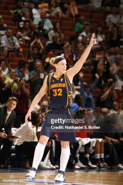 Katie Douglas of the Connecticut Sun celebrates while playing against the Houston Comets on July 22, 2007 at Mohegan Sun in Uncasville, Cononecticut....