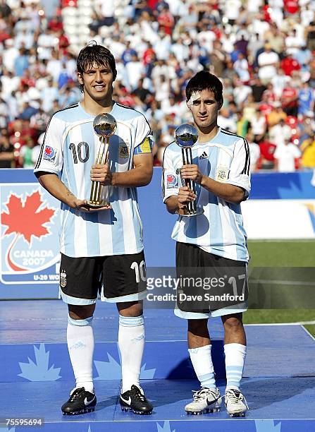 Sergio Aguero and Maximiliano Moralez both of Team Argentina hold the Golden Ball awards for the most outstanding player of the competition , after...