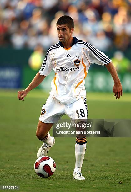 Kyle Martino of the Los Angeles Galaxy sets to pass the ball in the first half against Chelsea FC during the World Series of Football match at the...