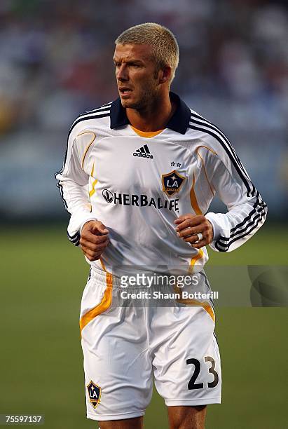 David Beckham of the Los Angeles Galaxy looks to defend the play in the second half against Chelsea FC during the World Series of Football match at...