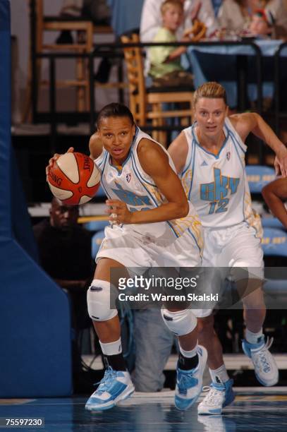 Armintie Price of the Chicago Sky followed by Stacey Dales breaking away from San Antonio Silver Stars at the UIC Pavilion July 22, 2007 in Chicago,...